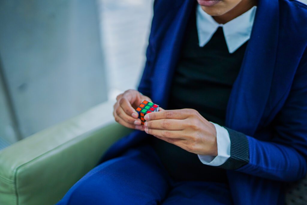 Woman with a mental health condition uses a fidget toy at work