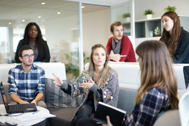 6 colleagues in a meeting having a discussion