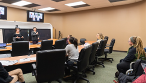 A photo of a speaking event.