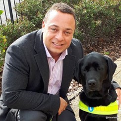 Dan Williams with his guide dog Zodiac.