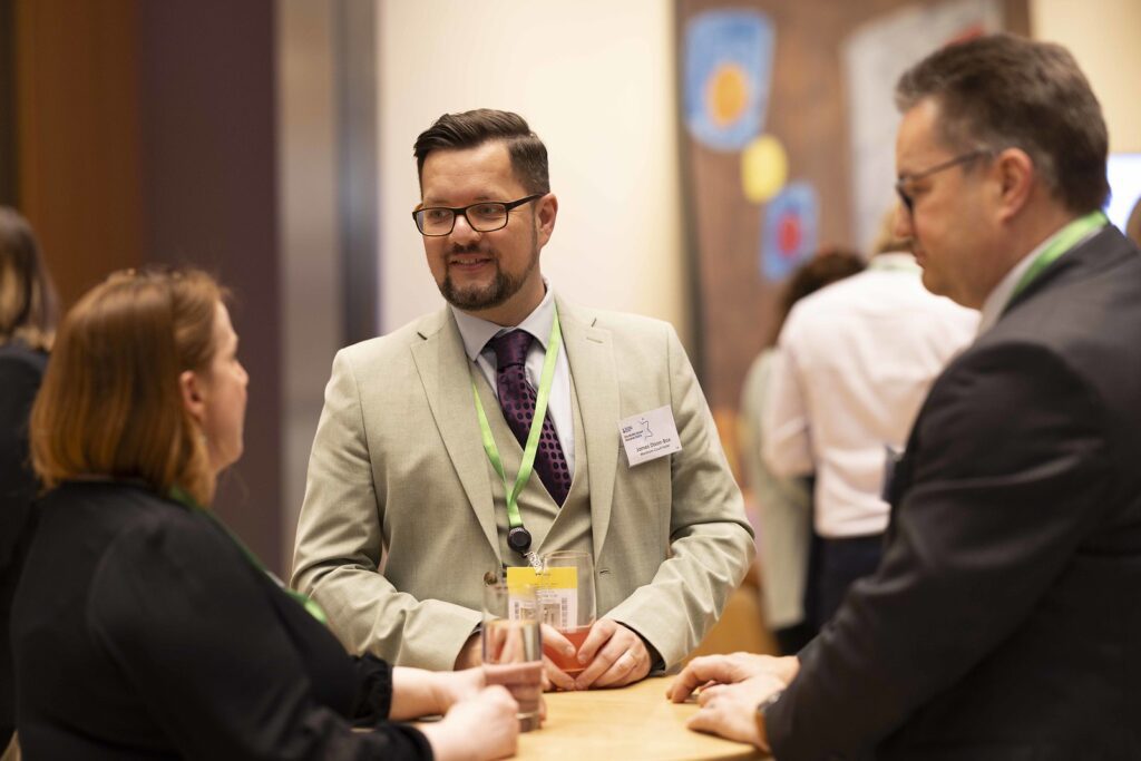 3 delegates network in the reception area of the Disability Smart Awards 2024 ceremony.