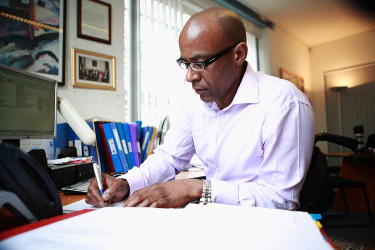 Image of man working at desk