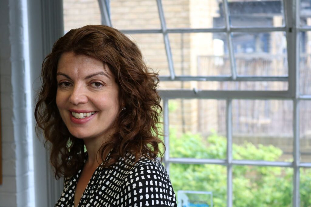 A photo of Diane Lightfoot in front of a window