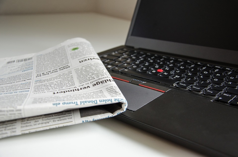 Newspaper on a laptop