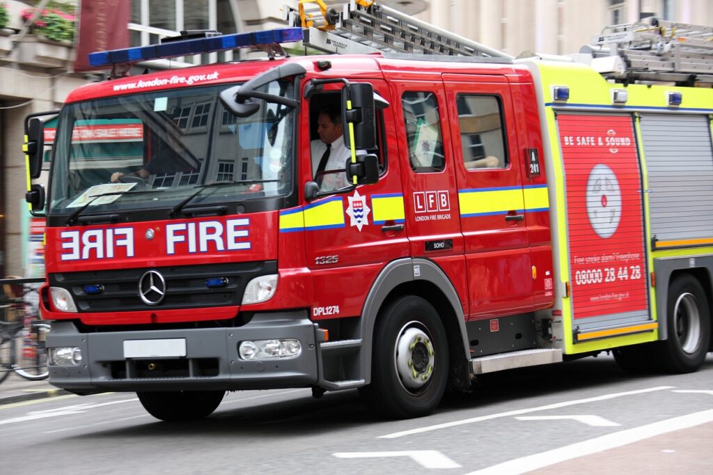 A fire engine out on the street.