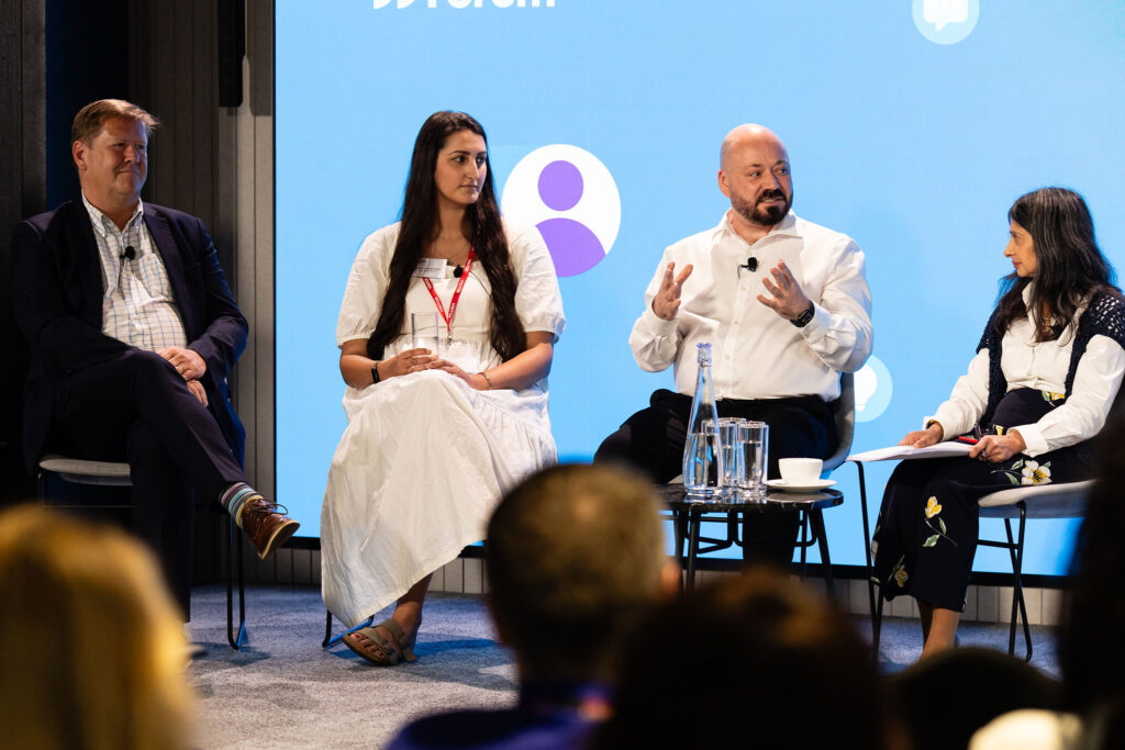 Andy Garrett, Safia Kukaswadia, Charles Clement and Bela Gor on stage at the Business Disability Forum 2024 Annual Conference.