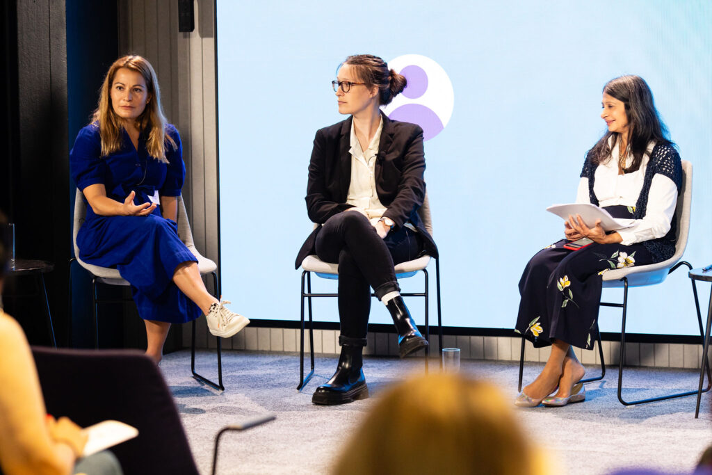 Vasiliki Arvaniti, Emily Jackson and Bela Gor onstage at the Business Disability Forum 2024 Annual Conference.